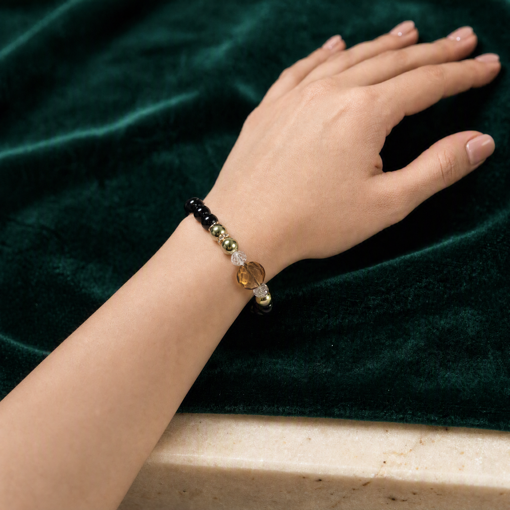 Black and gold beaded bracelet styled view