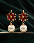 Red floral pearl drop earrings portrait product view