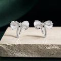 Silver Bow Stud Earrings by RARE